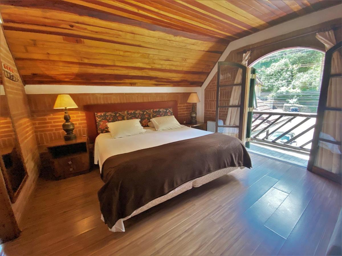 Quarto com Cama King-size e Varanda