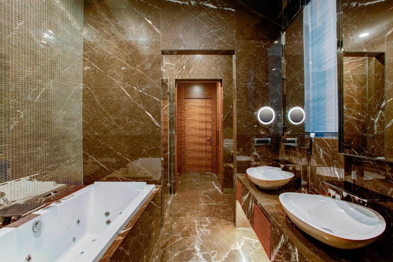 Präsidentensuite mit 1 Kingsize-Bett und 2 Einzelbetten
