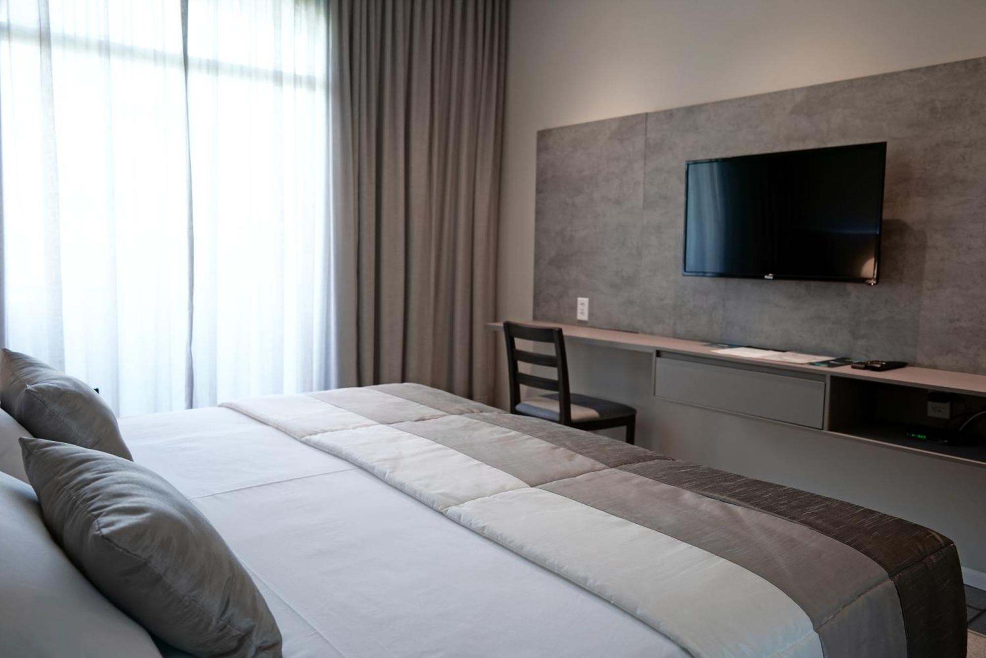 Quarto Deluxe Duplo com Vista da Piscina