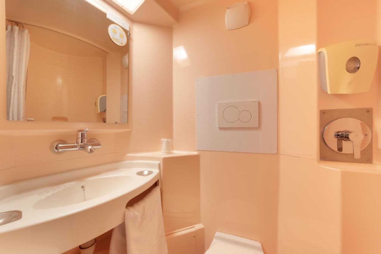 Chambre Triple (1 Lit Double et 1 Lit Simple)