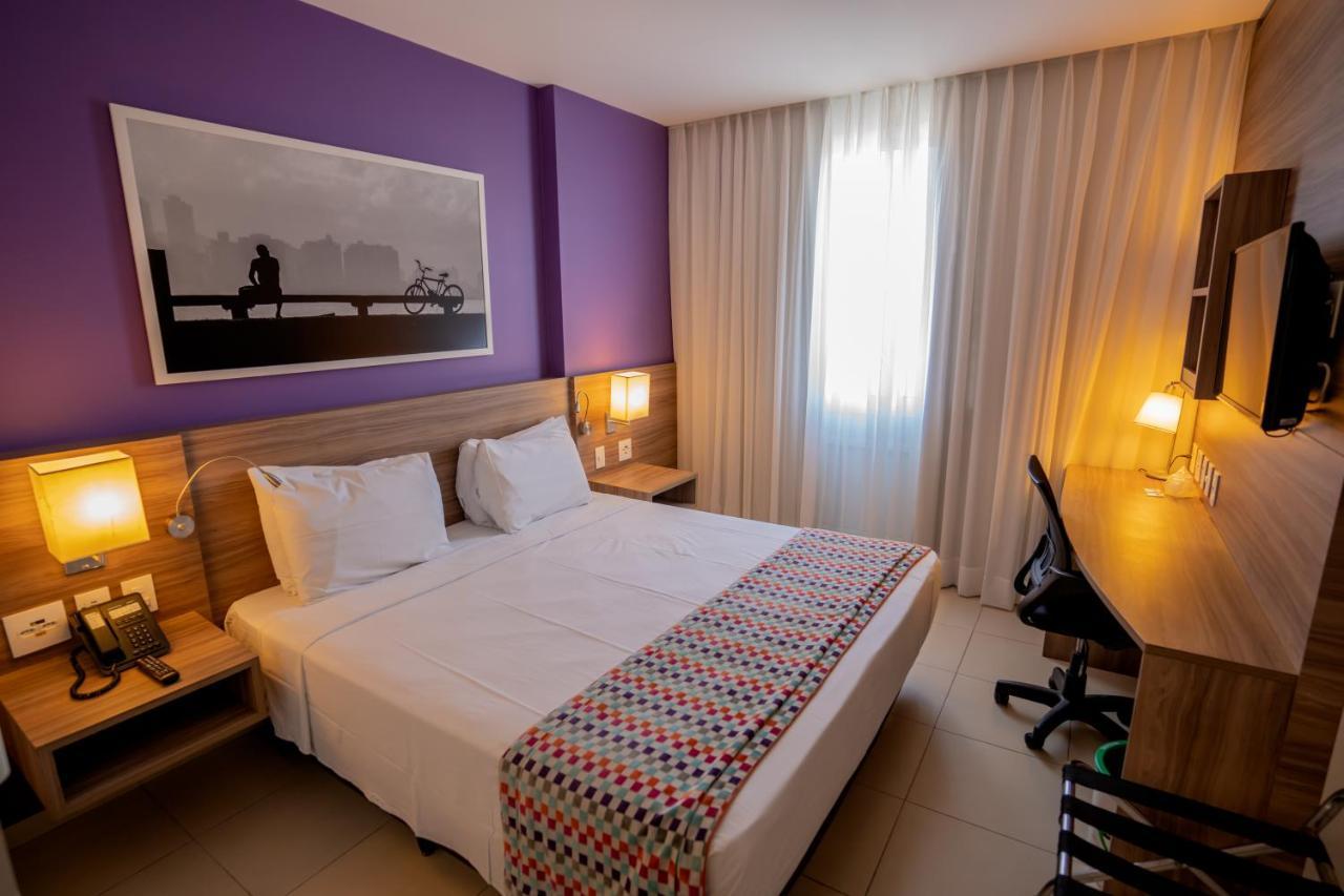 Quarto superior premium com cama queen-size