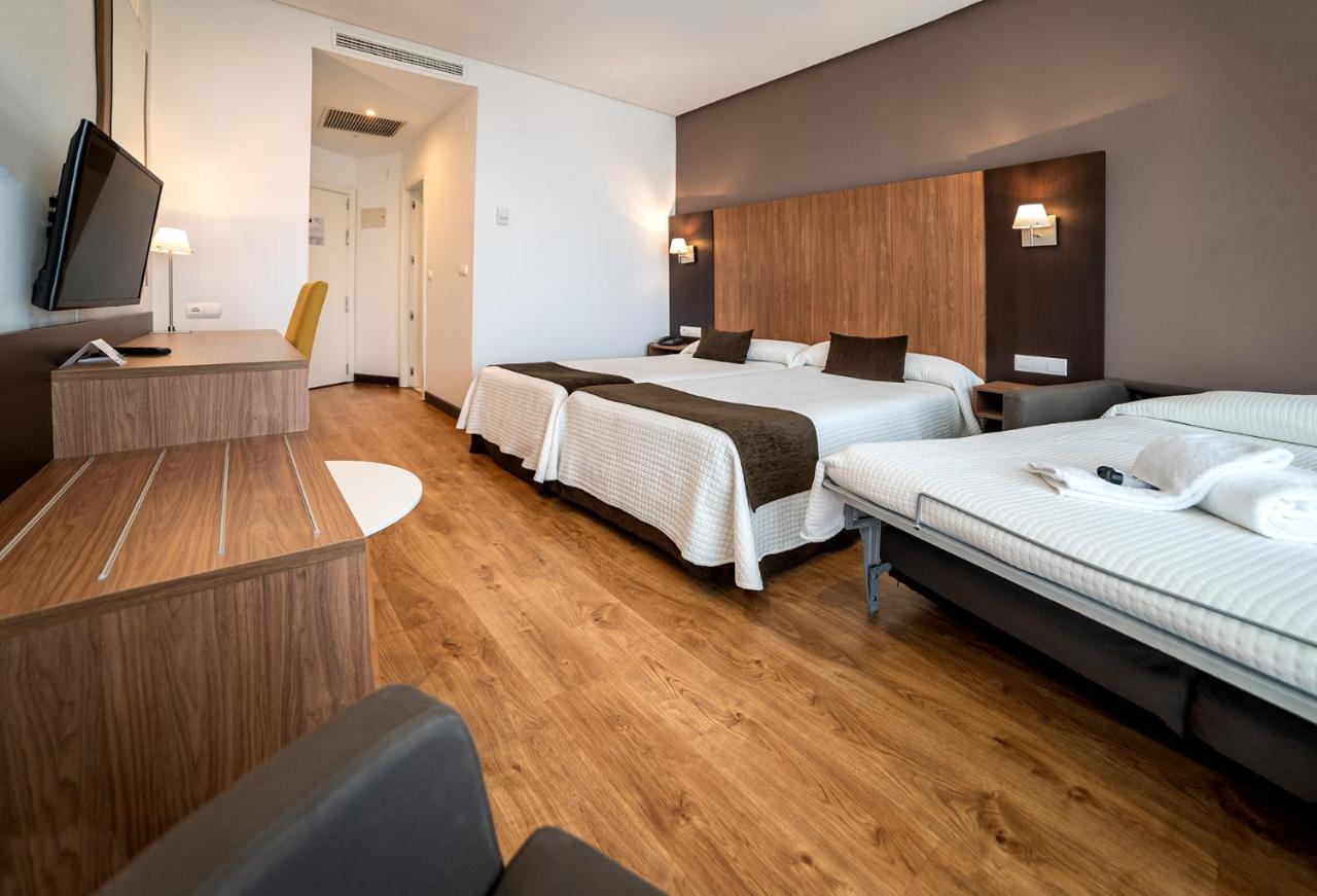 Habitación Doble (2 adultos + 1 niño) - 1 o 2 camas