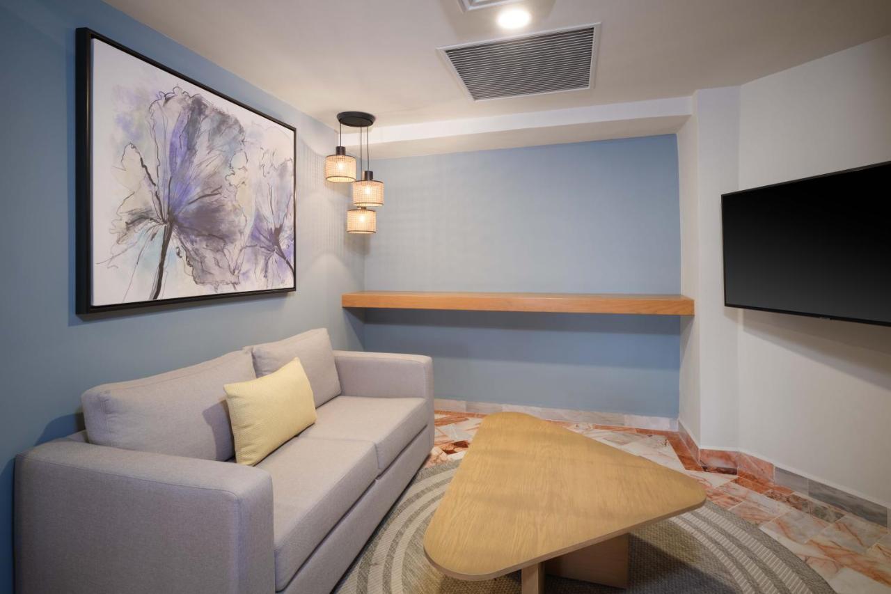 Suite Executive con 1 cama extragrande y 2 camas dobles - No fumadores