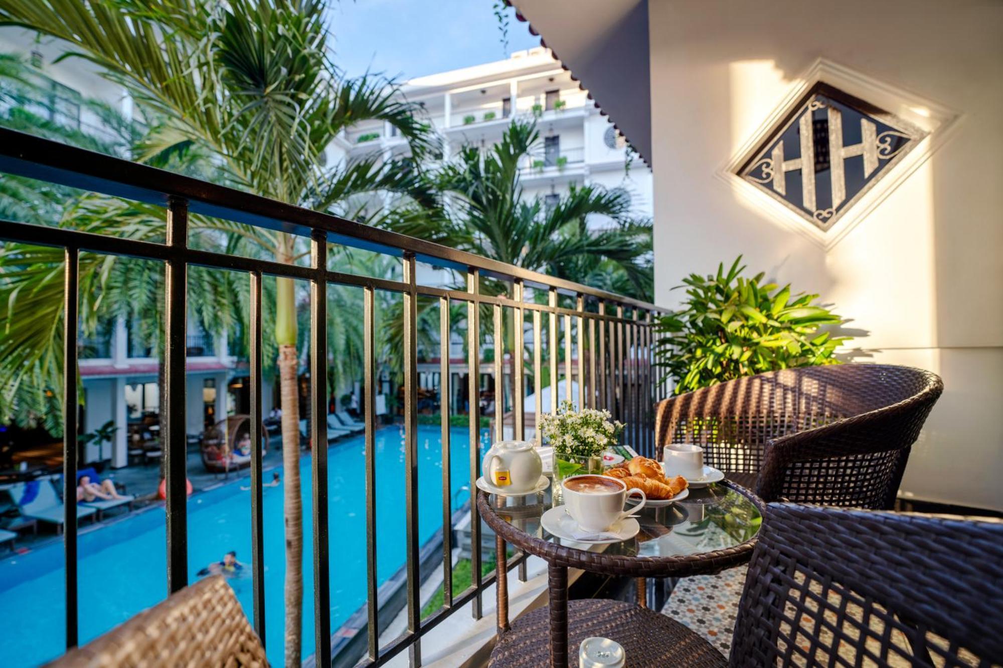 Senior Twin Room with Balcony and Pool View