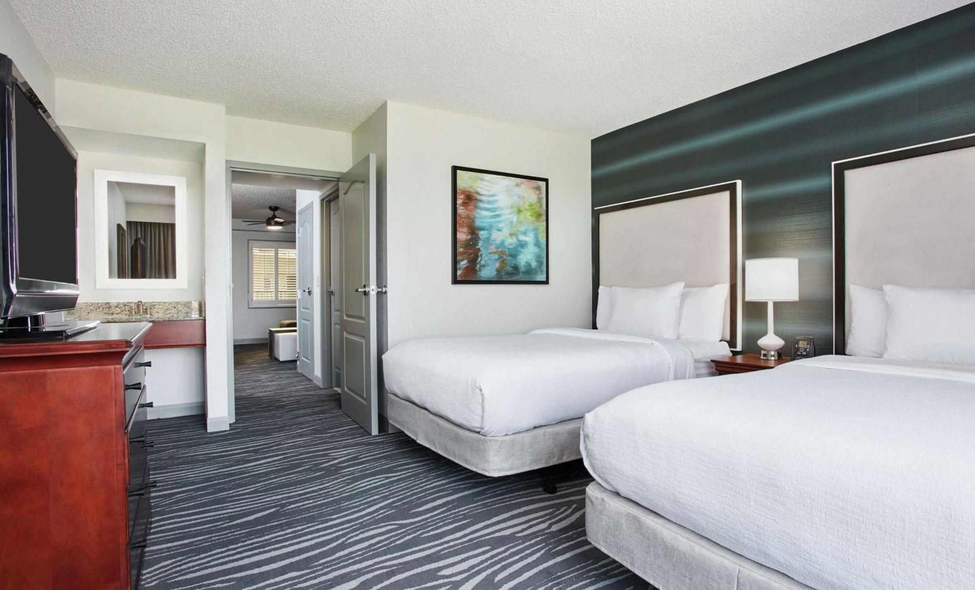 One-Bedroom Suite Two Double Beds One Sofa Bed