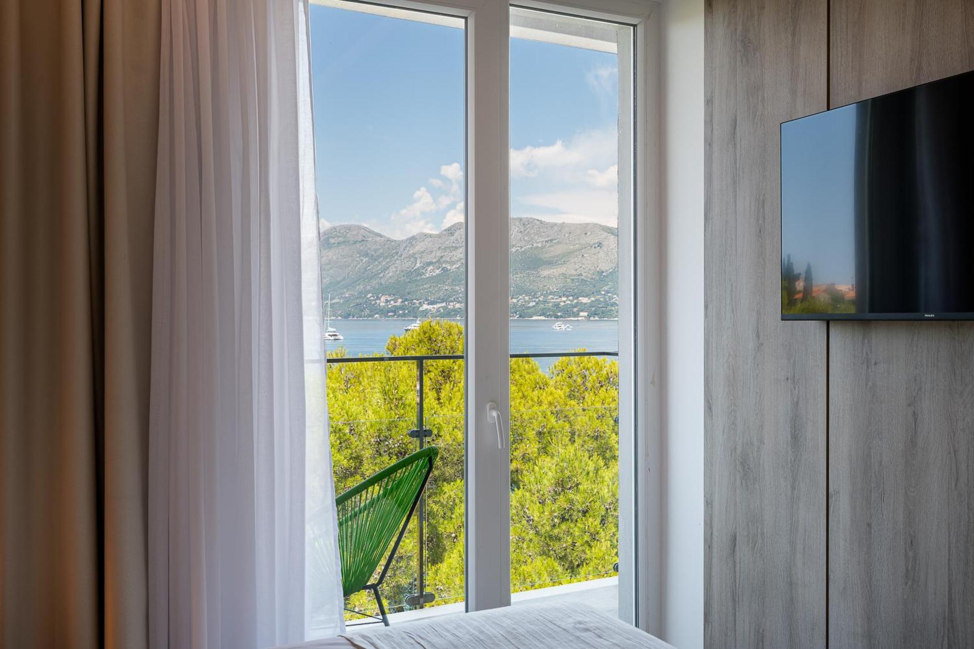 Chambre Classique avec Balcon - Vue Partielle sur Mer