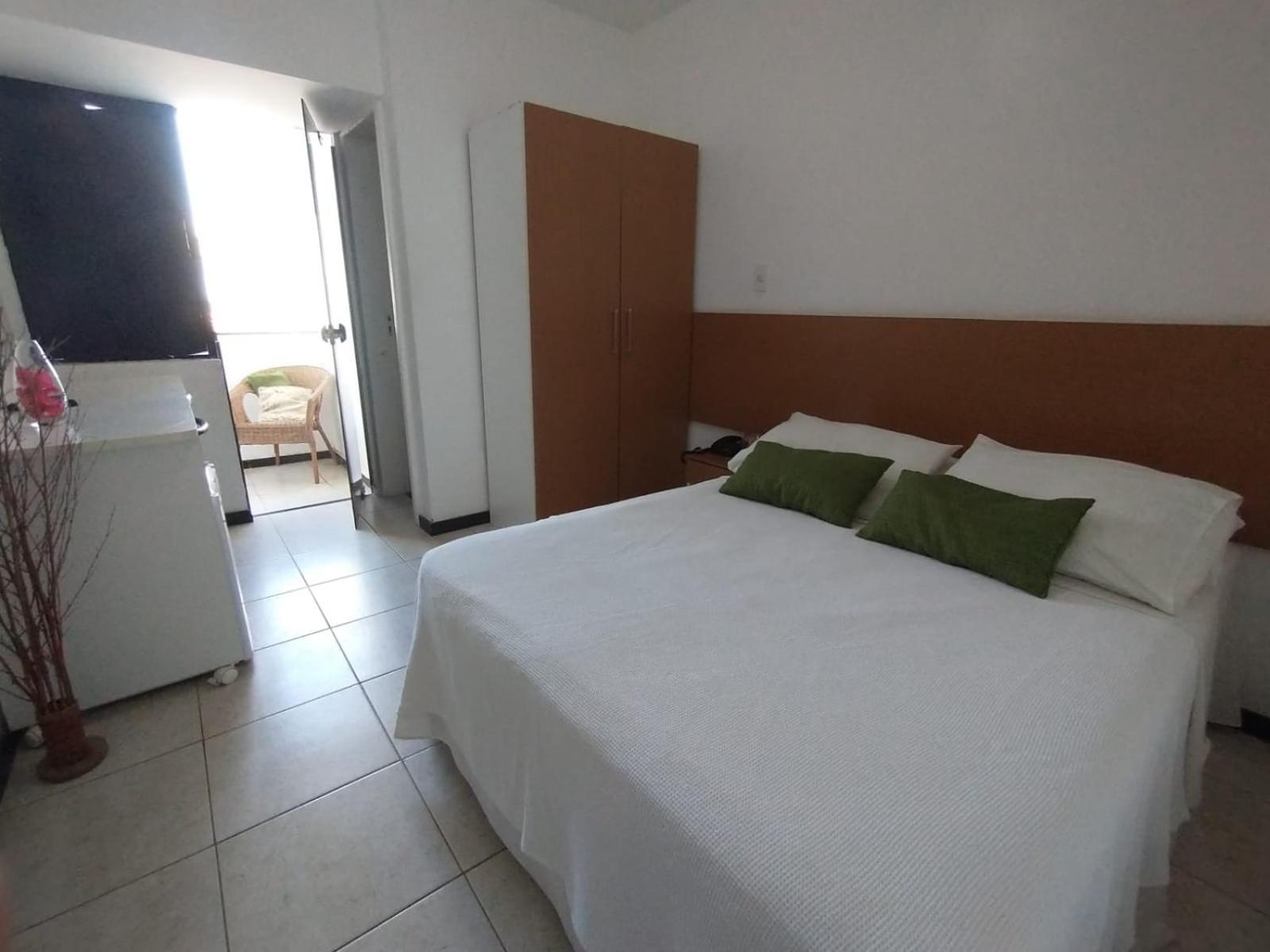 Quarto Quádruplo com Vista do Mar.