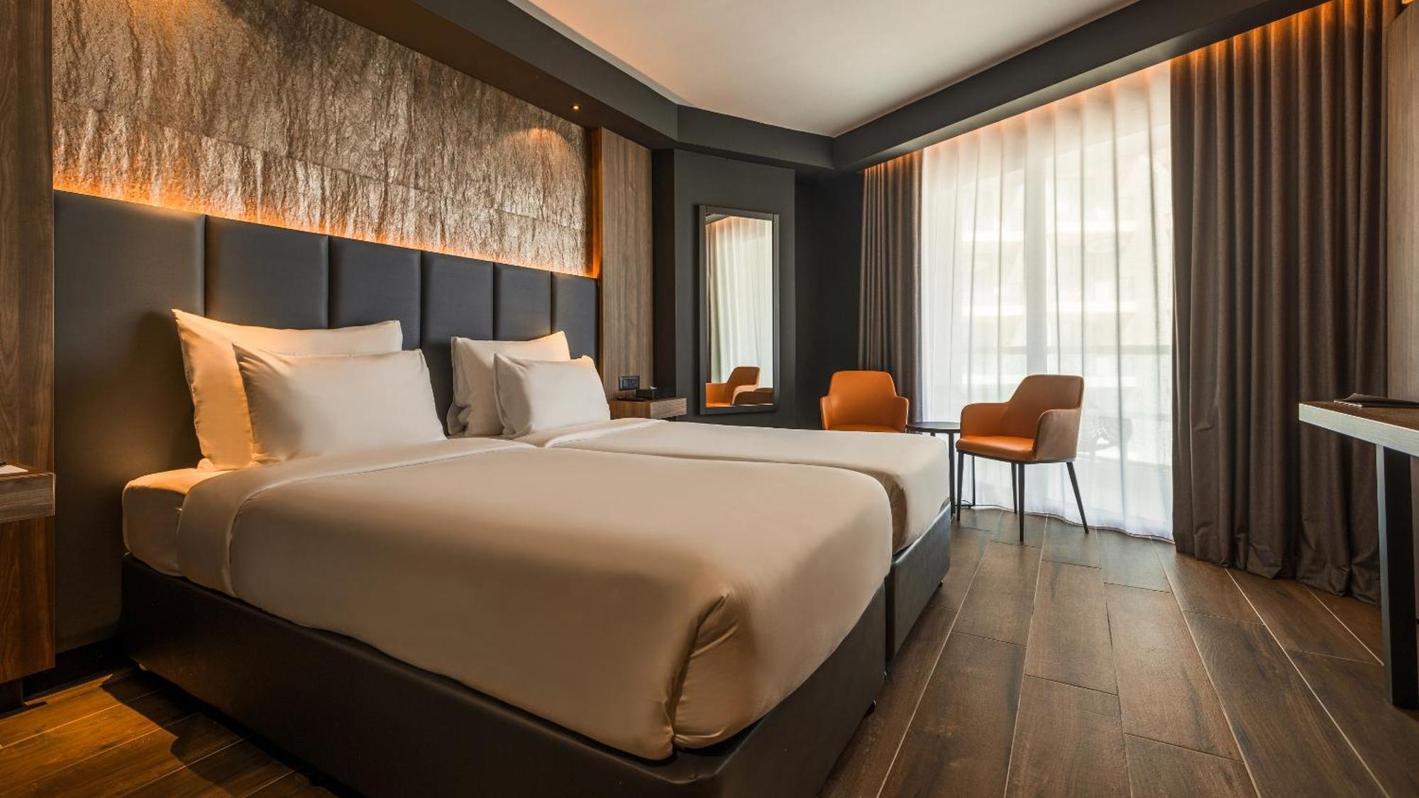 Quarto Duplo ou Twin Deluxe com Vista Mar Parcial