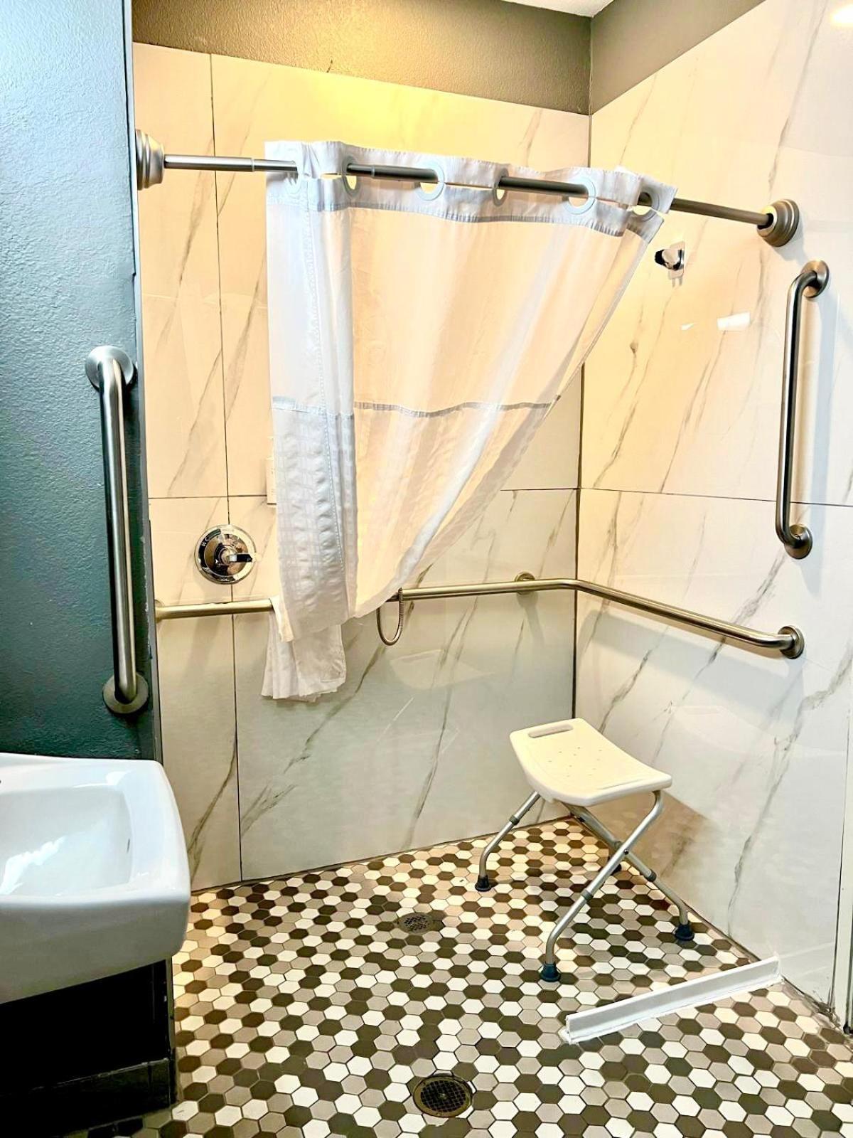 2 Queen Bed Mobility or Hearing Accessible Roll Shower Non-Smoking