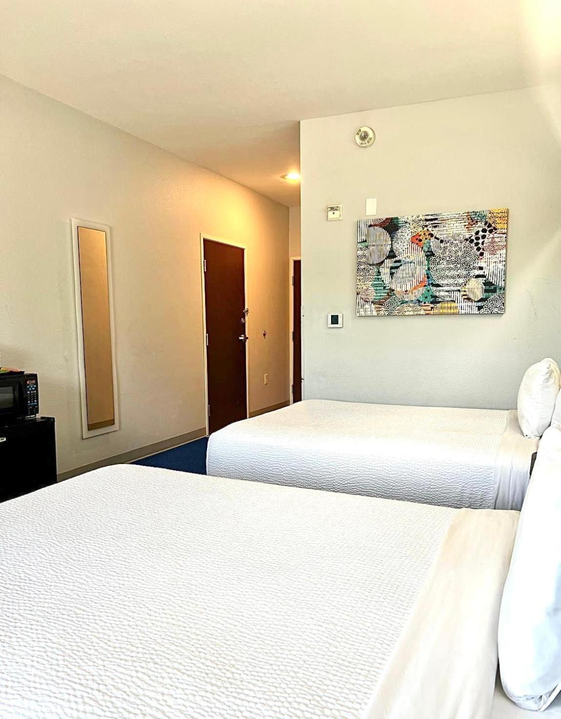2 Queen Beds Mobility or Hearing Accessible Room Bathtub w or Grab Bars Non-Smoking