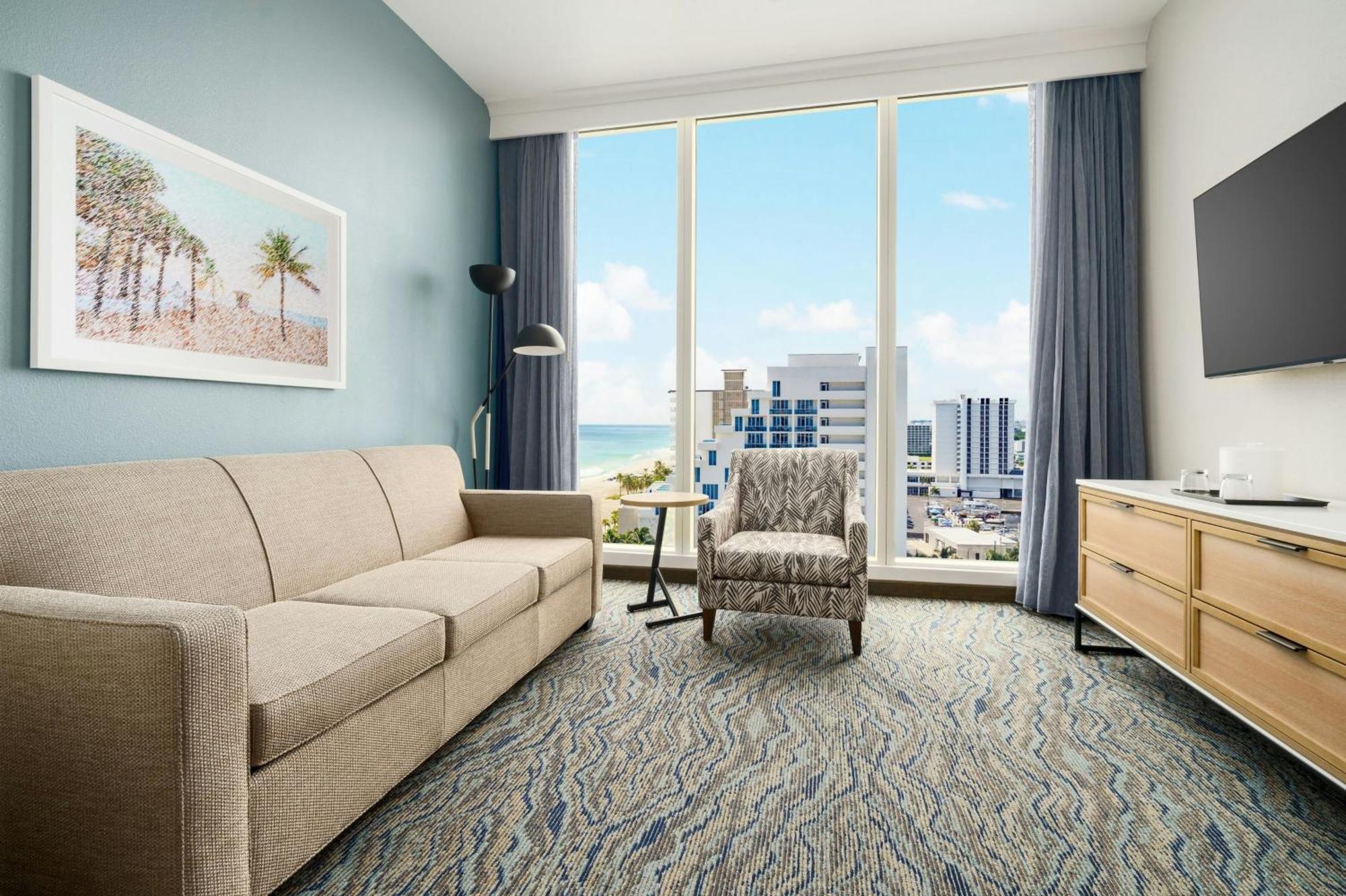 One-Bedroom King Suite with Partial Ocean View and Sofa Bed