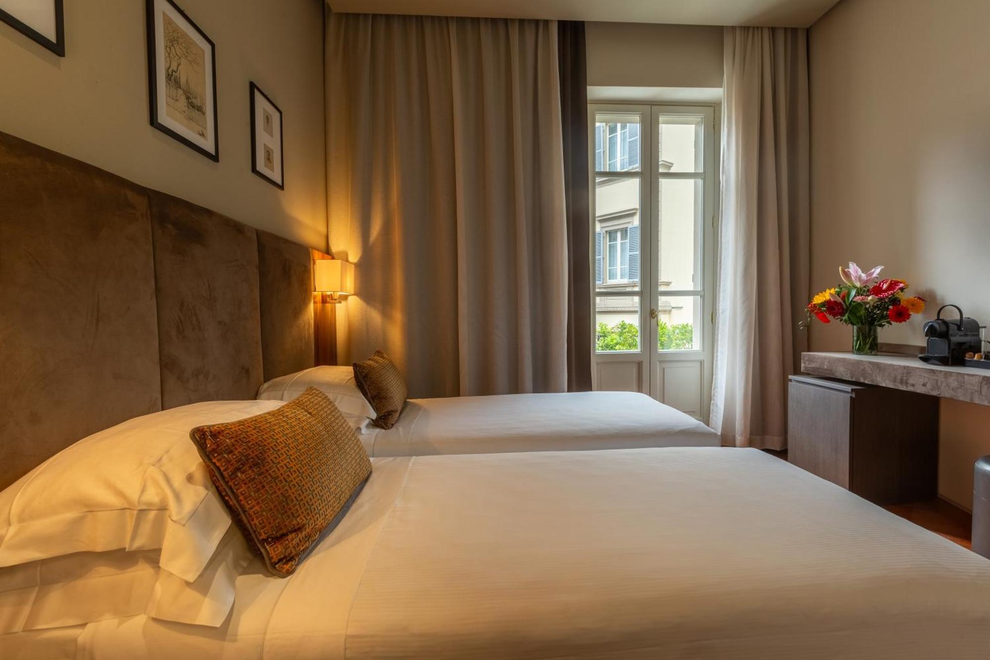 Quarto Deluxe com Cama de Casal ou 2 de Solteiro e Varanda