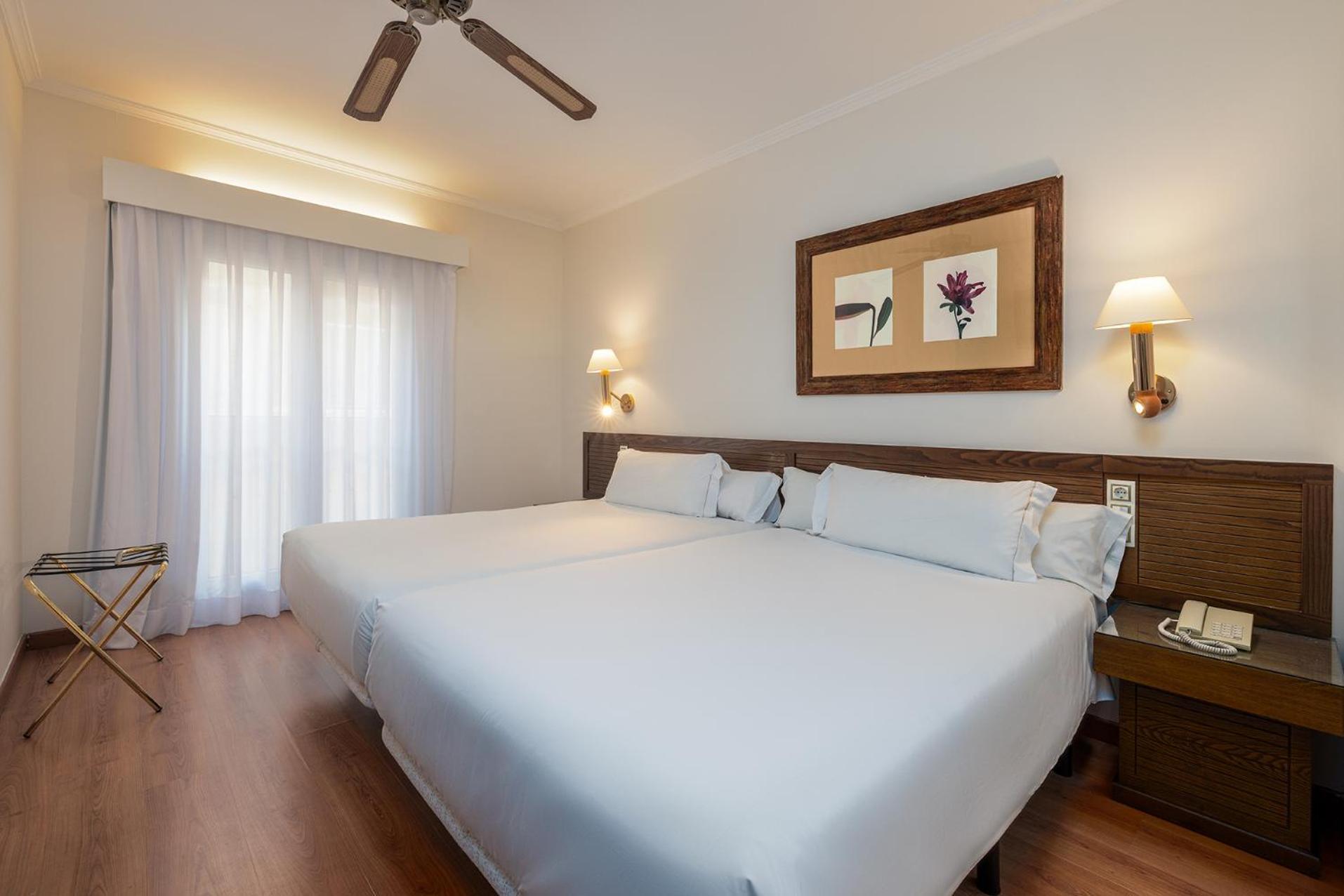 Two Connecting Double Rooms (2 Adults + 2 Children)