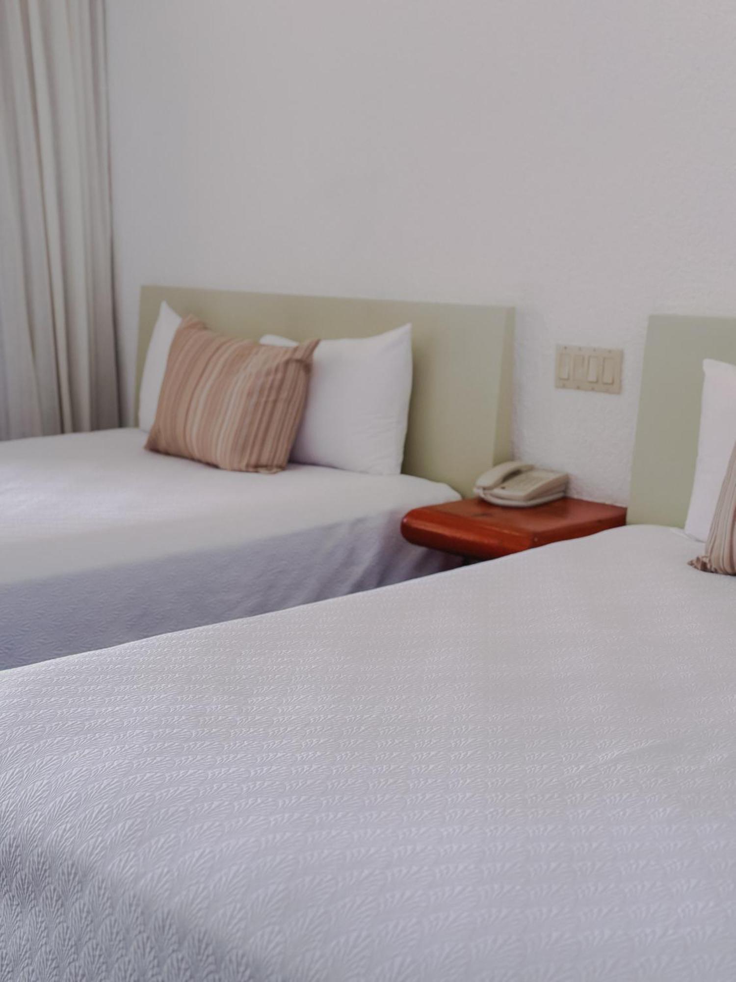 Standard Room 2 queen size beds balcony