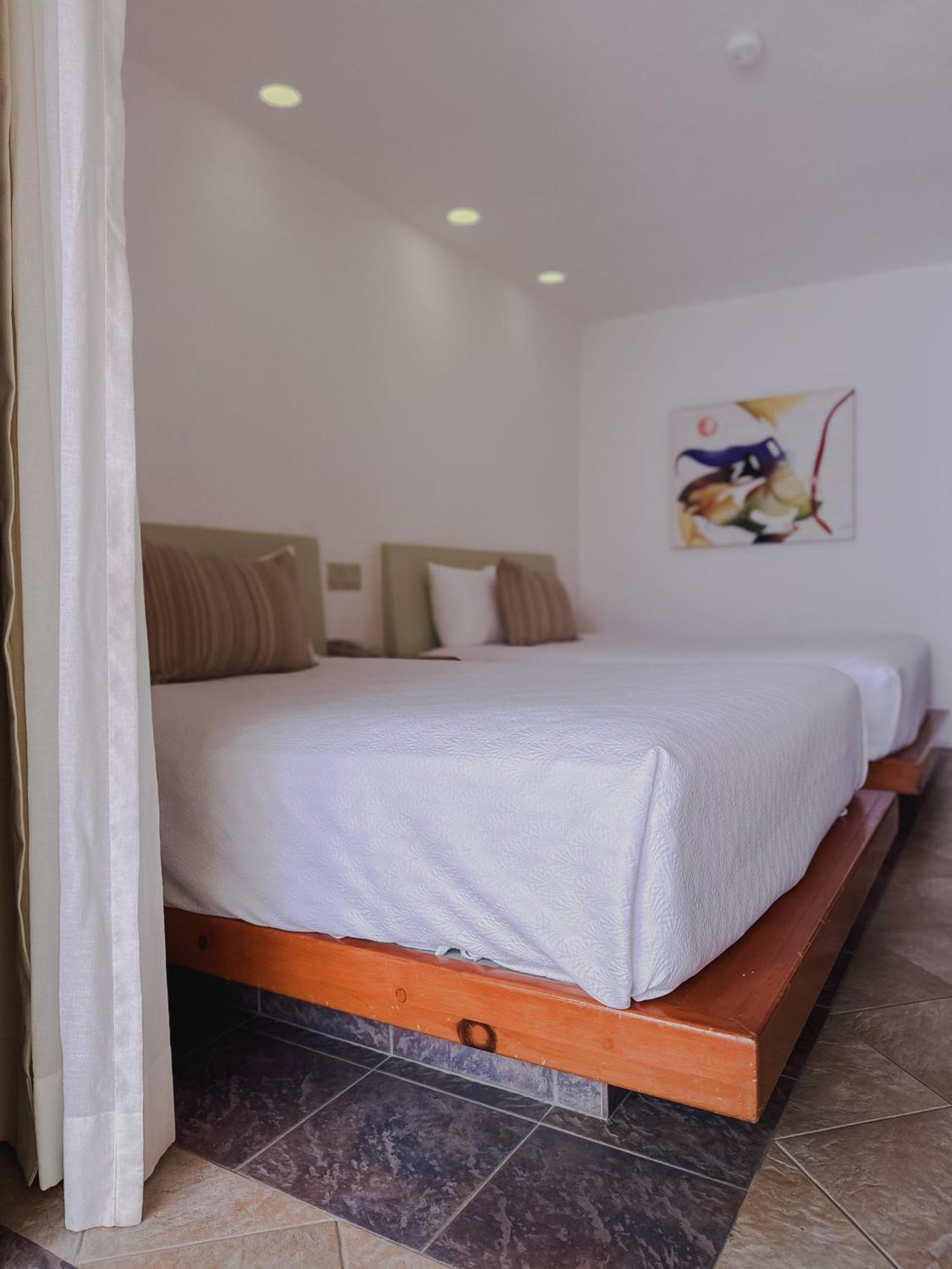 Standard Room 2 queen size beds balcony