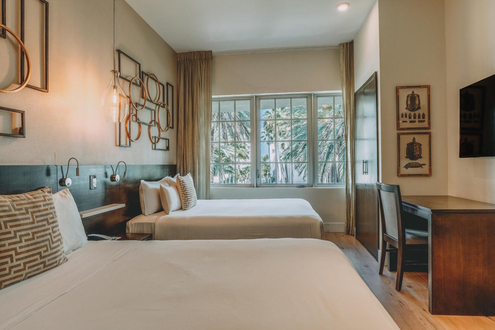Quarto duplo premium com cama queen-size e vista da cidade - Uso individual