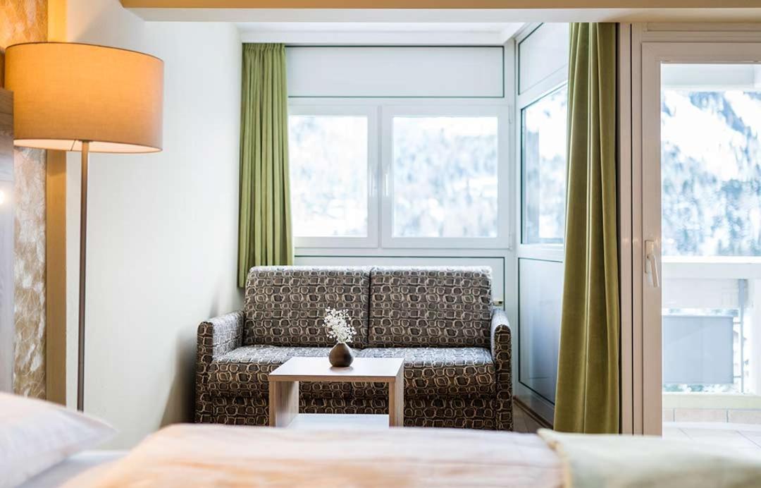 Quarto Triplo com Vista para a Montanha