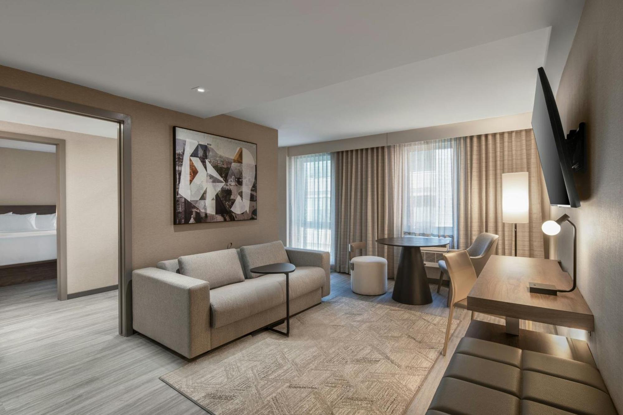 Deluxe Queen Room with Two Queen Beds and Sofa Bed