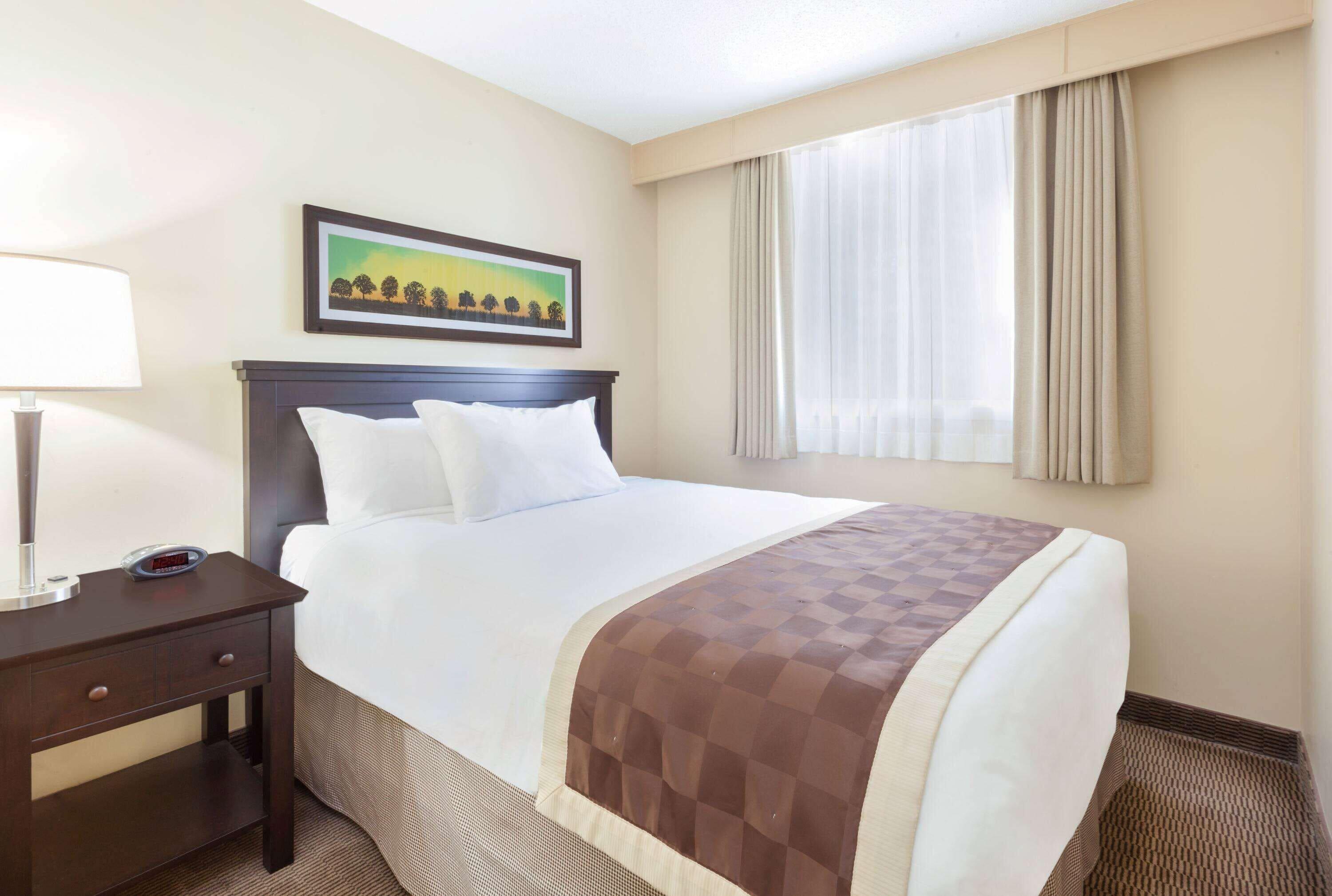 Room One Queen Bed One Twin Bed Roll Shower Mobility Accessible or Non-Smoking