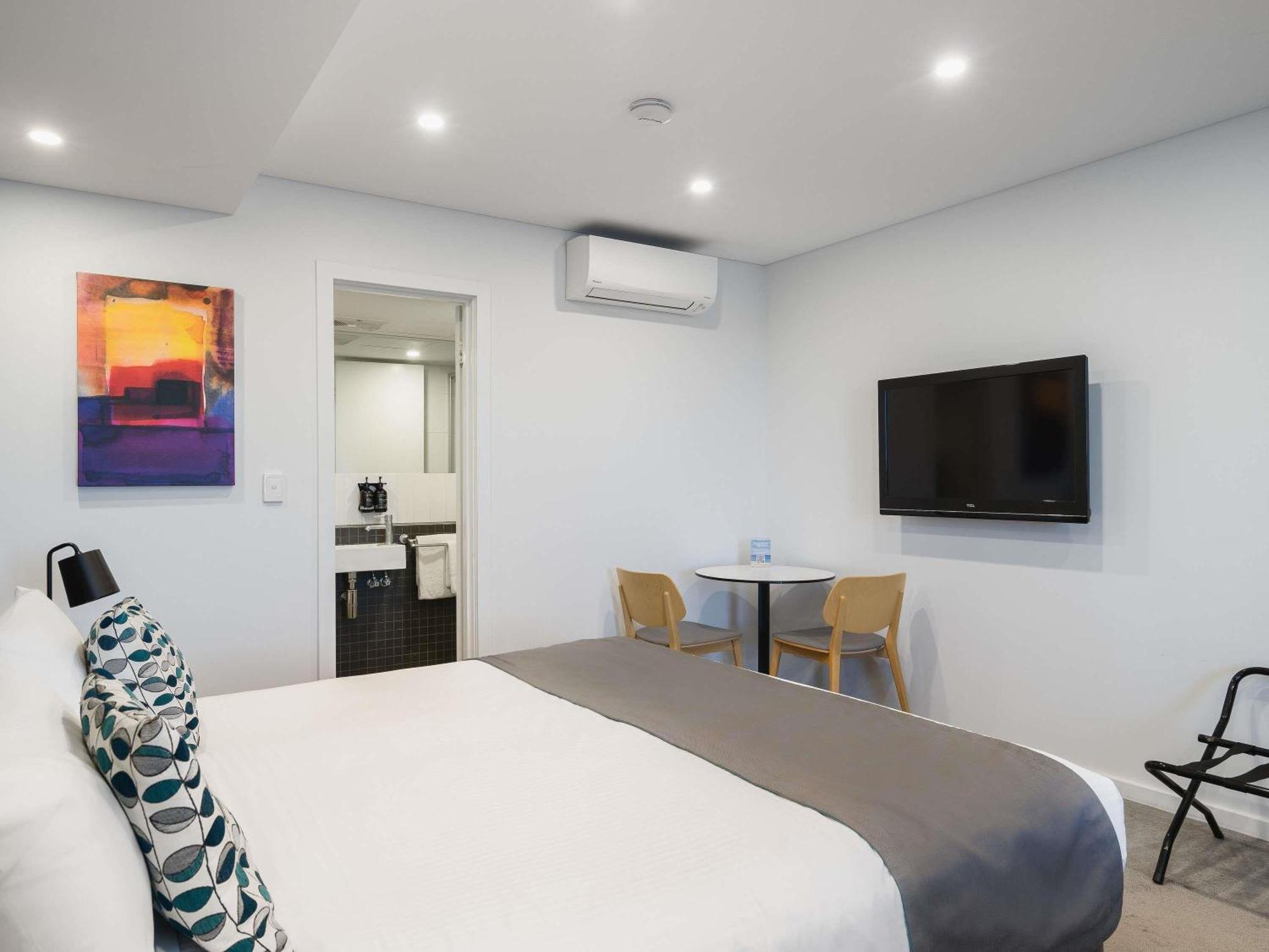 Standard Room One King One Single Beds