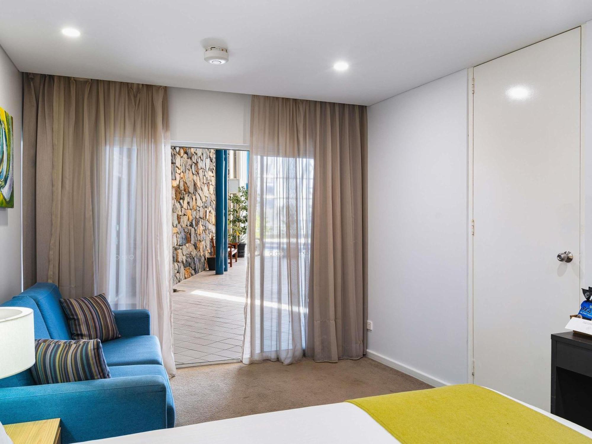 Standard Room One Queen Bed Pool Side