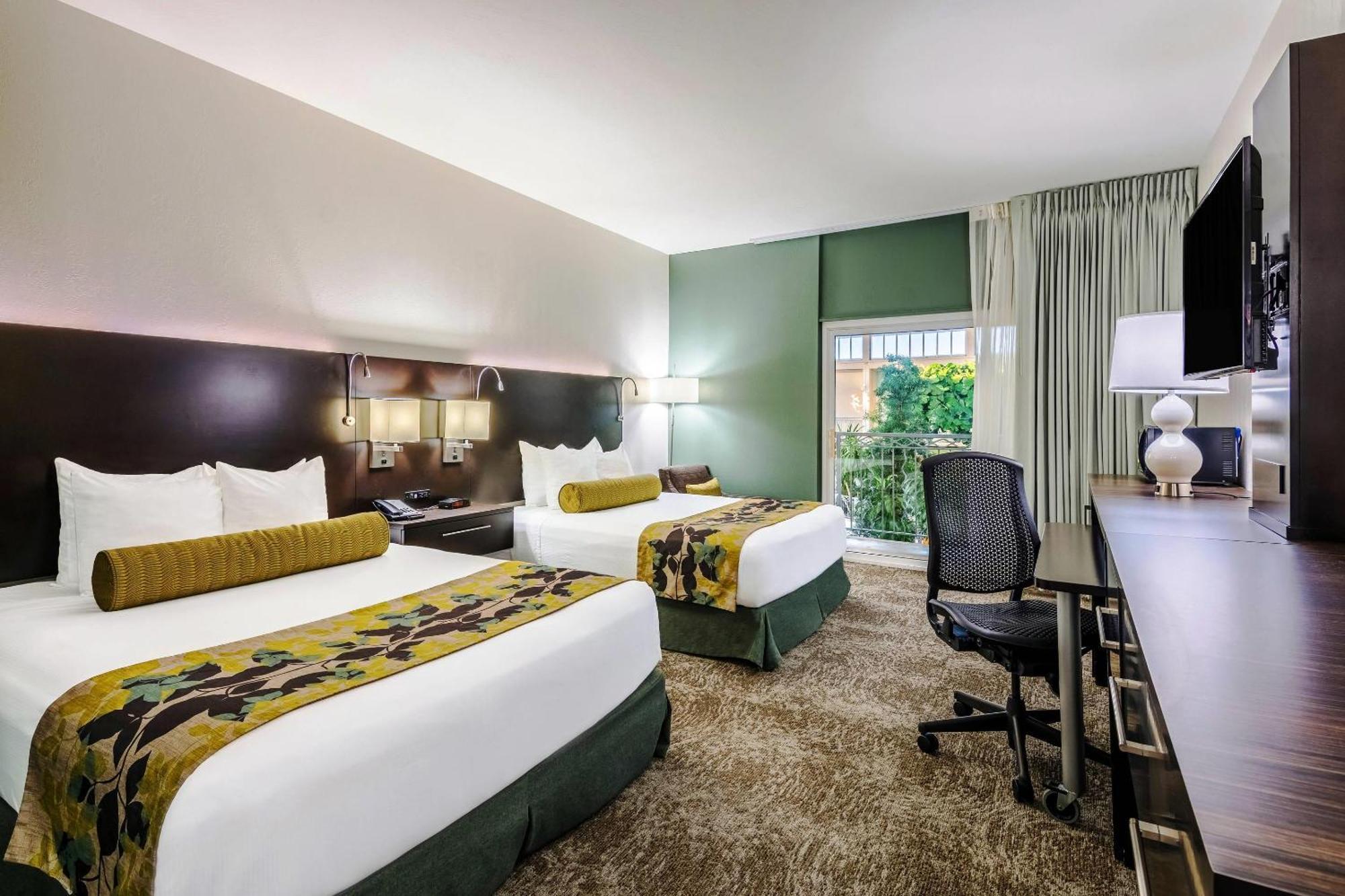 Queen Room with Two Queen Beds and Pool View - Non-Smoking