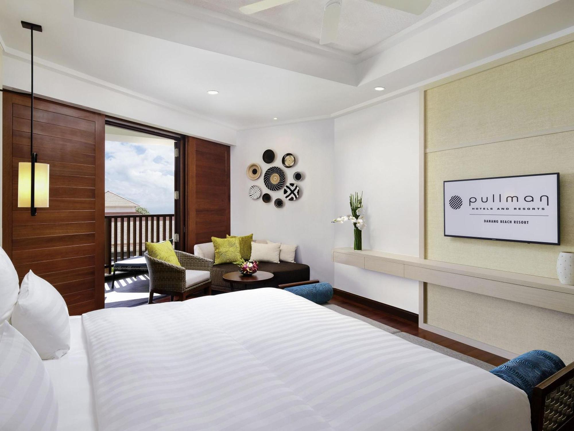Deluxe Zimmer mit Queensize-Bett und seitlichem Meerblick