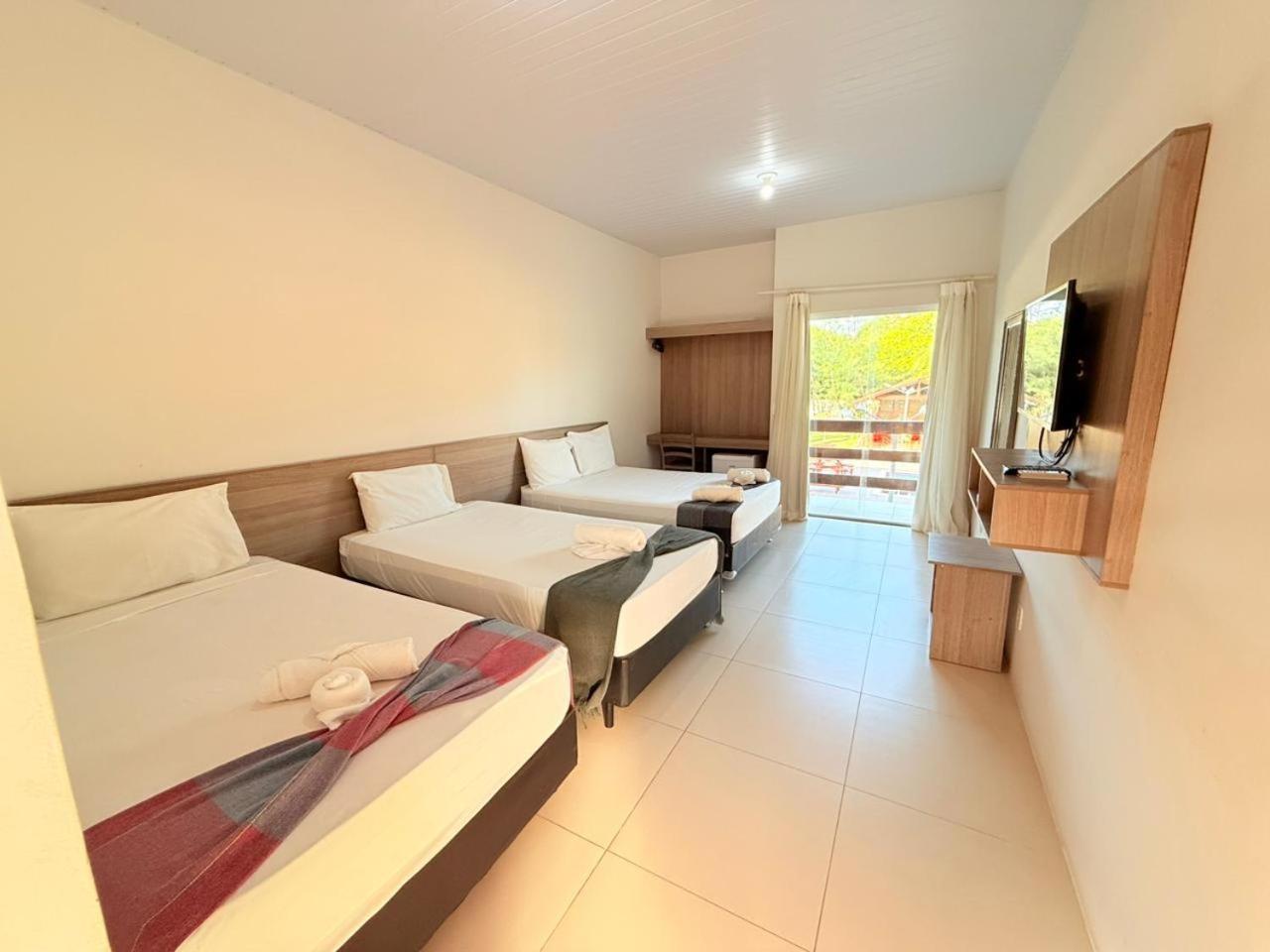 Quarto Quádruplo com Varanda