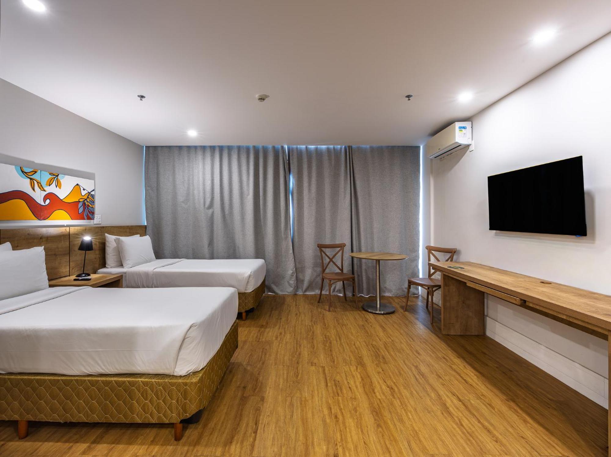 Quarto Deluxe com 2 Camas de Solteiro e Varanda