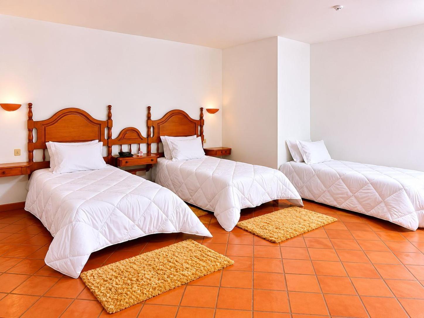 Quarto Twin com Cama Extra (3 Adultos)