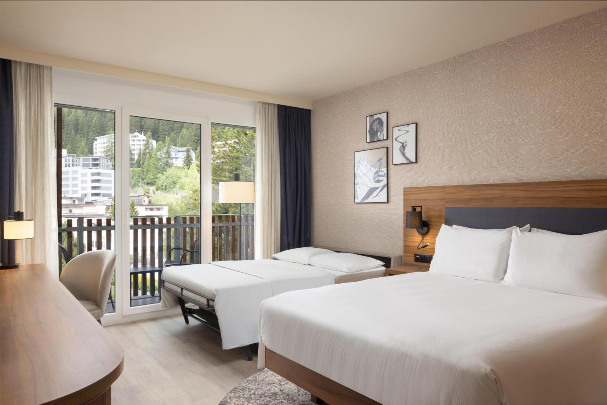Familiekamer met Queensize Bed en Slaapbank