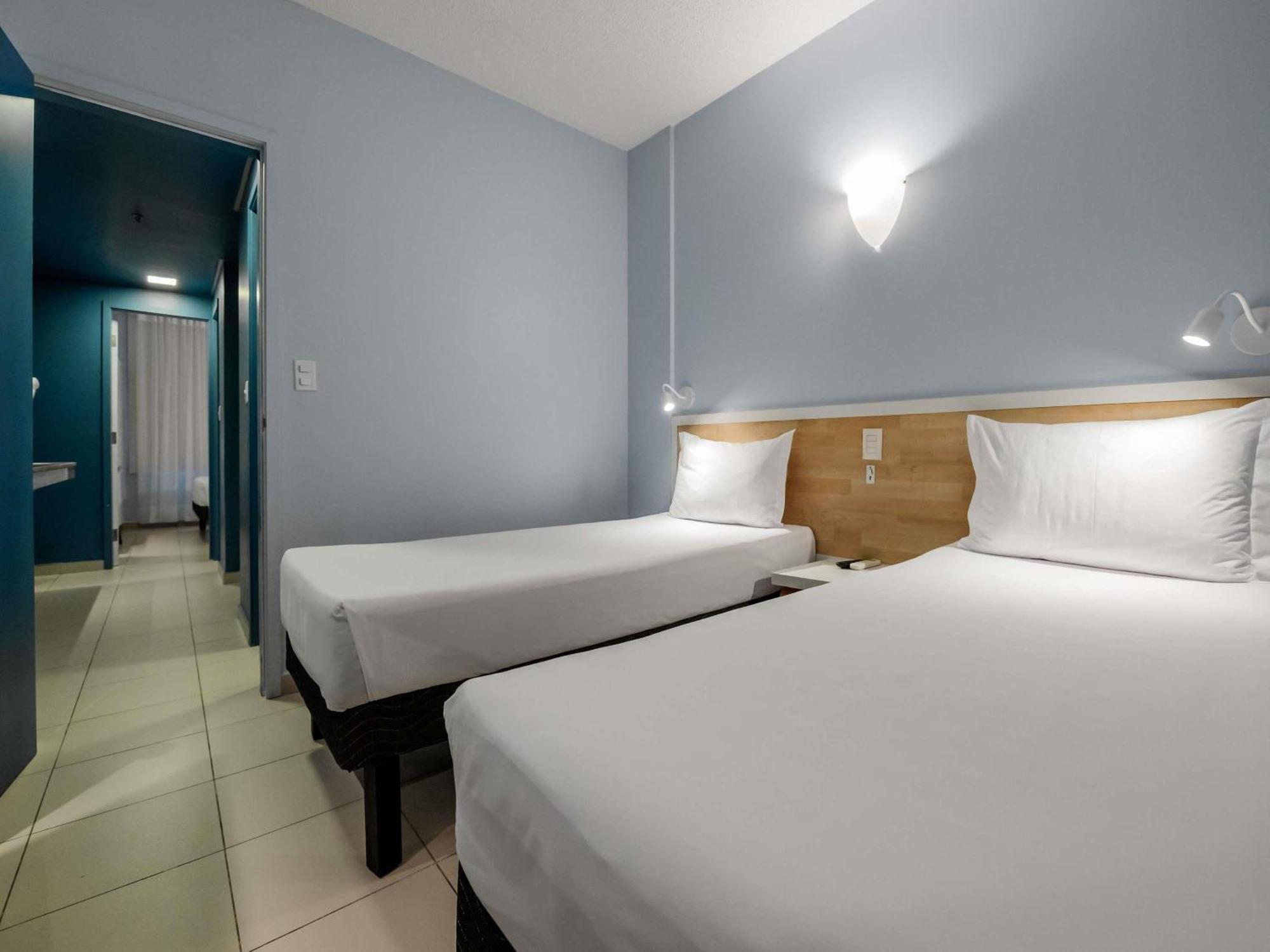 Standard Apartment with One Double Bed and Two Single Beds