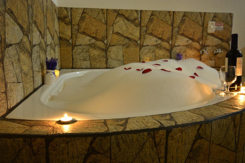 Chalé com Banheira de Hidromassagem