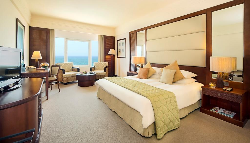 Deluxe Zimmer mit Kingsize-Bett mit Meerblick