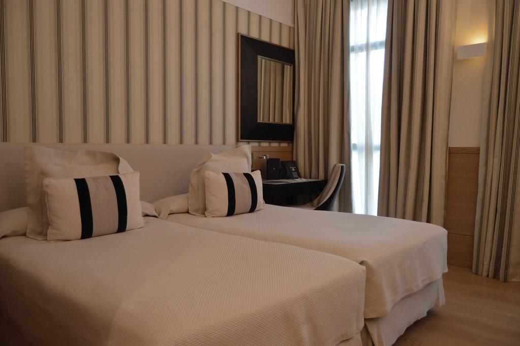 Habitación Doble Estándar con cama supletoria - 1 o 2 camas