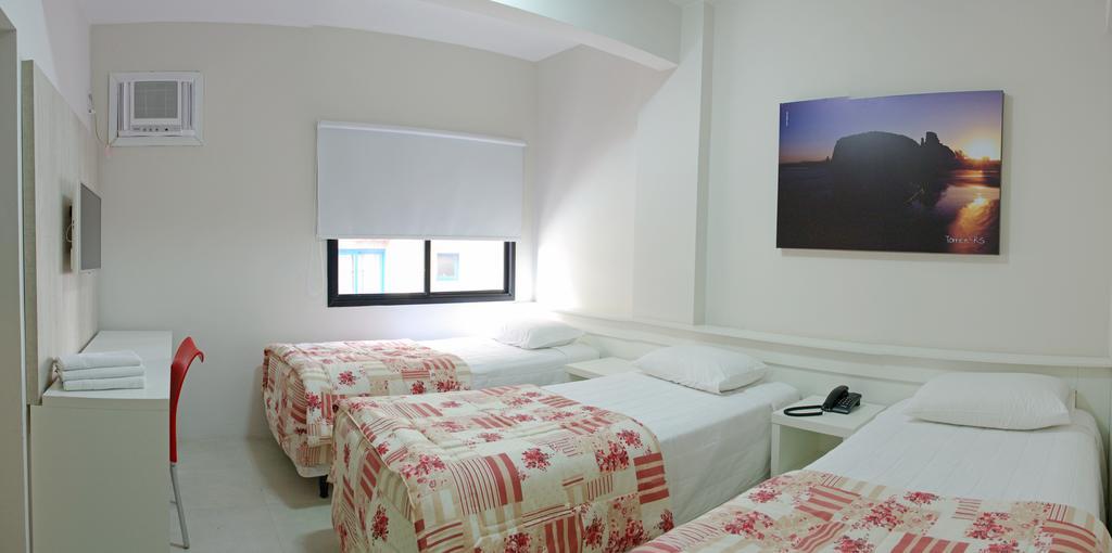 Quarto Triplo Deluxe (3 Camas de Solteiro)