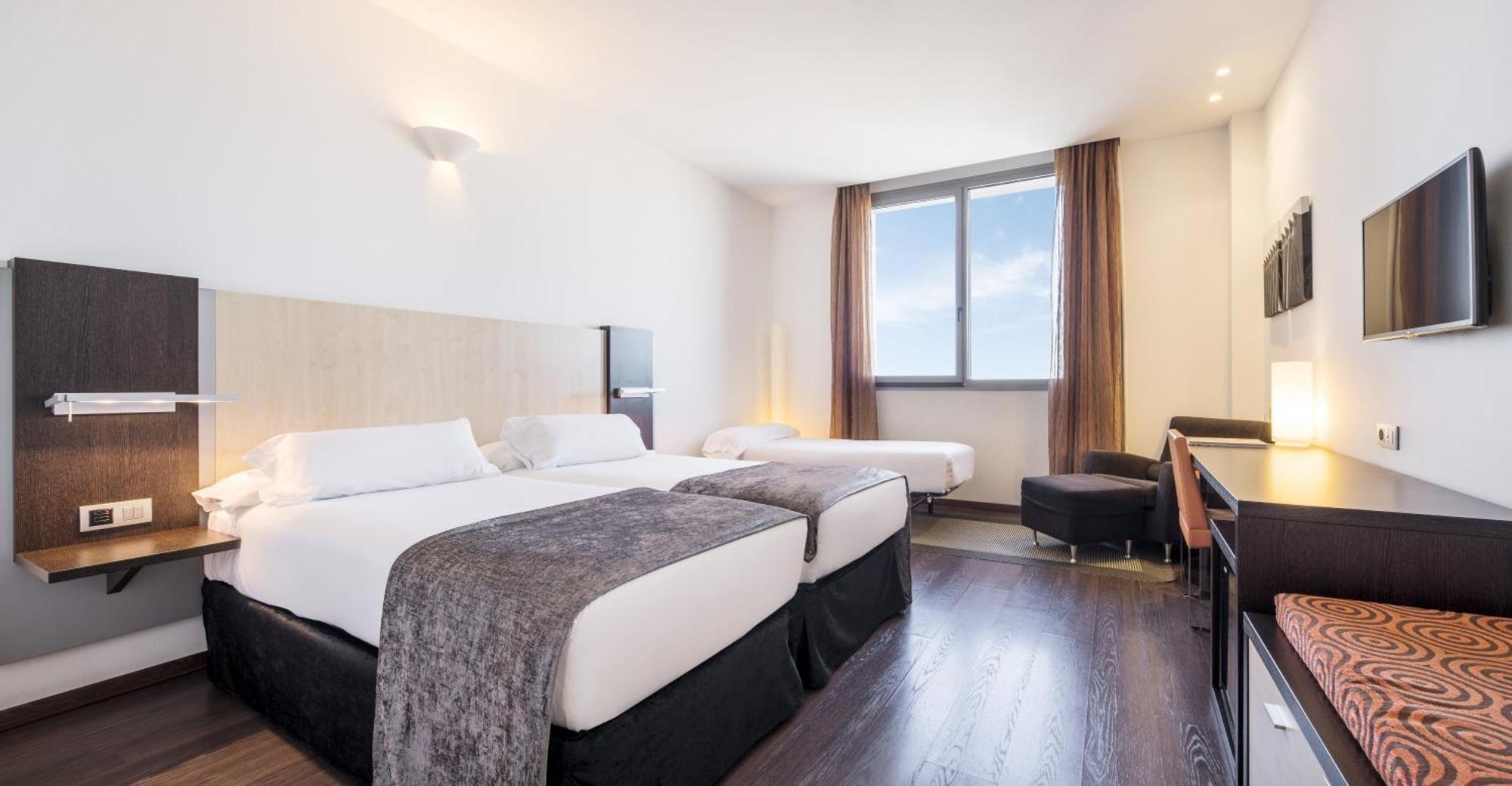 Triple Room (2 Adults + 1 Child)