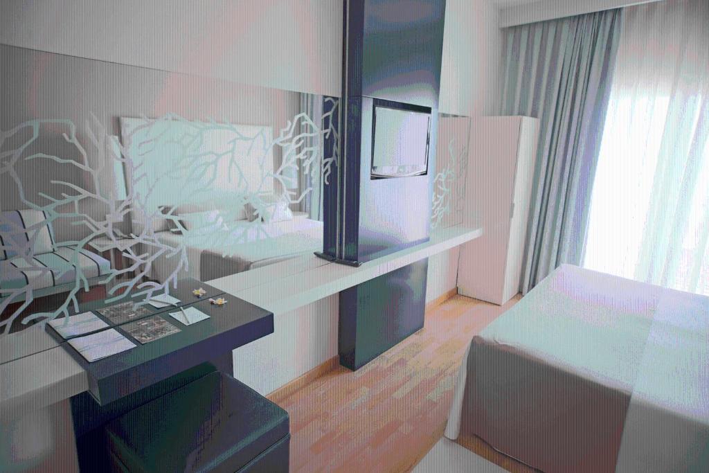 Chambre Triple Standard (2 Adultes + 1 Enfant)