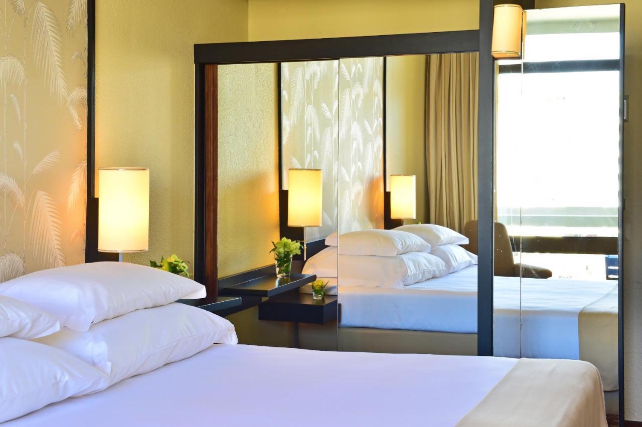 Quarto Triplo com Vista do Jardim