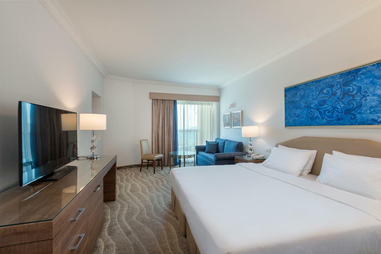 Deluxe Room with a French Balcony (2 Adults+1 Child)